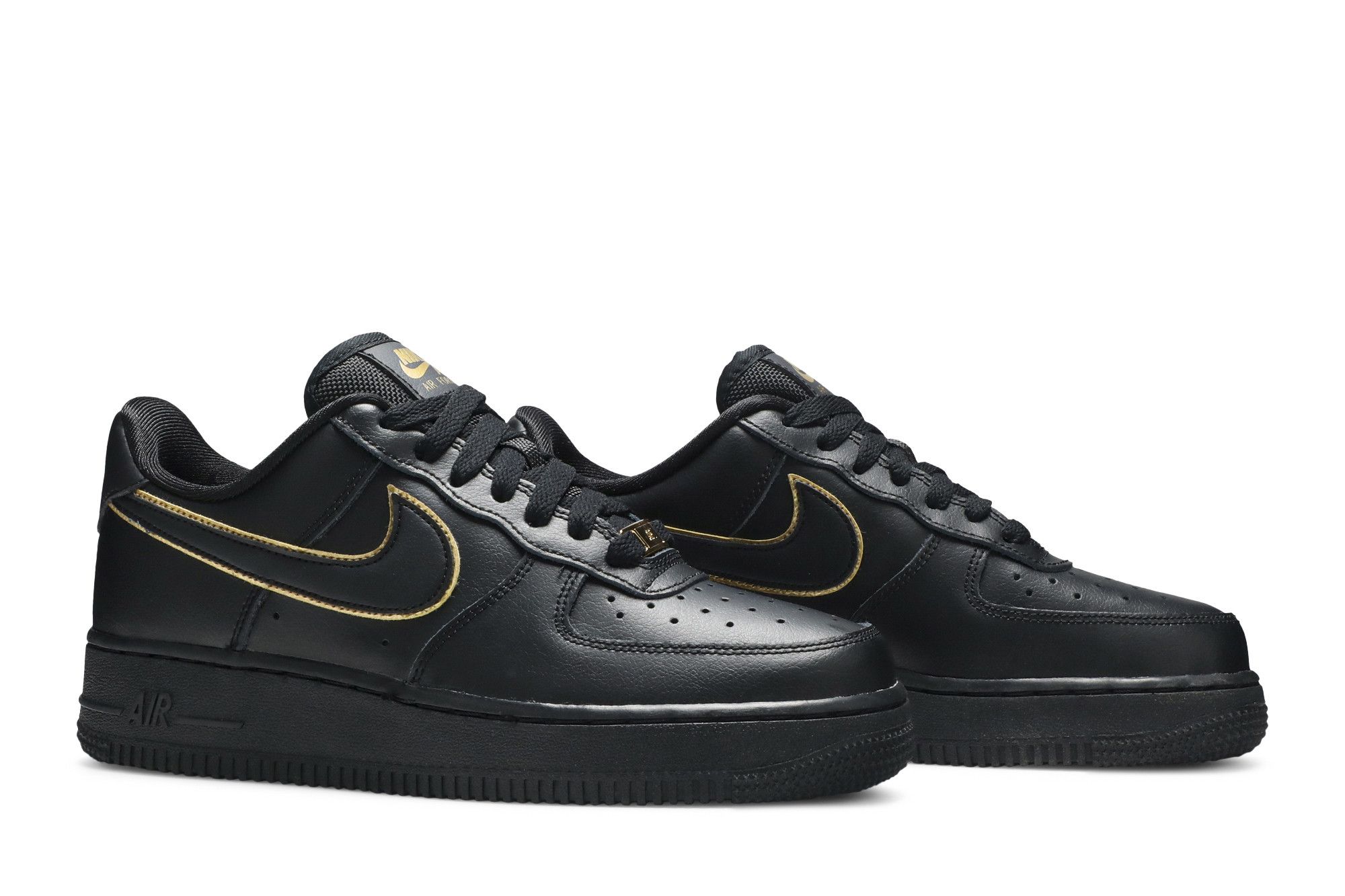 Black nikes with gold swoosh sales