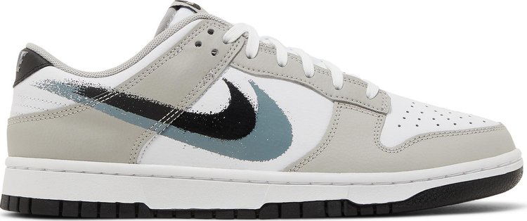 Nike Dunk Low Surfaces in Double Spray Painted Swooshes