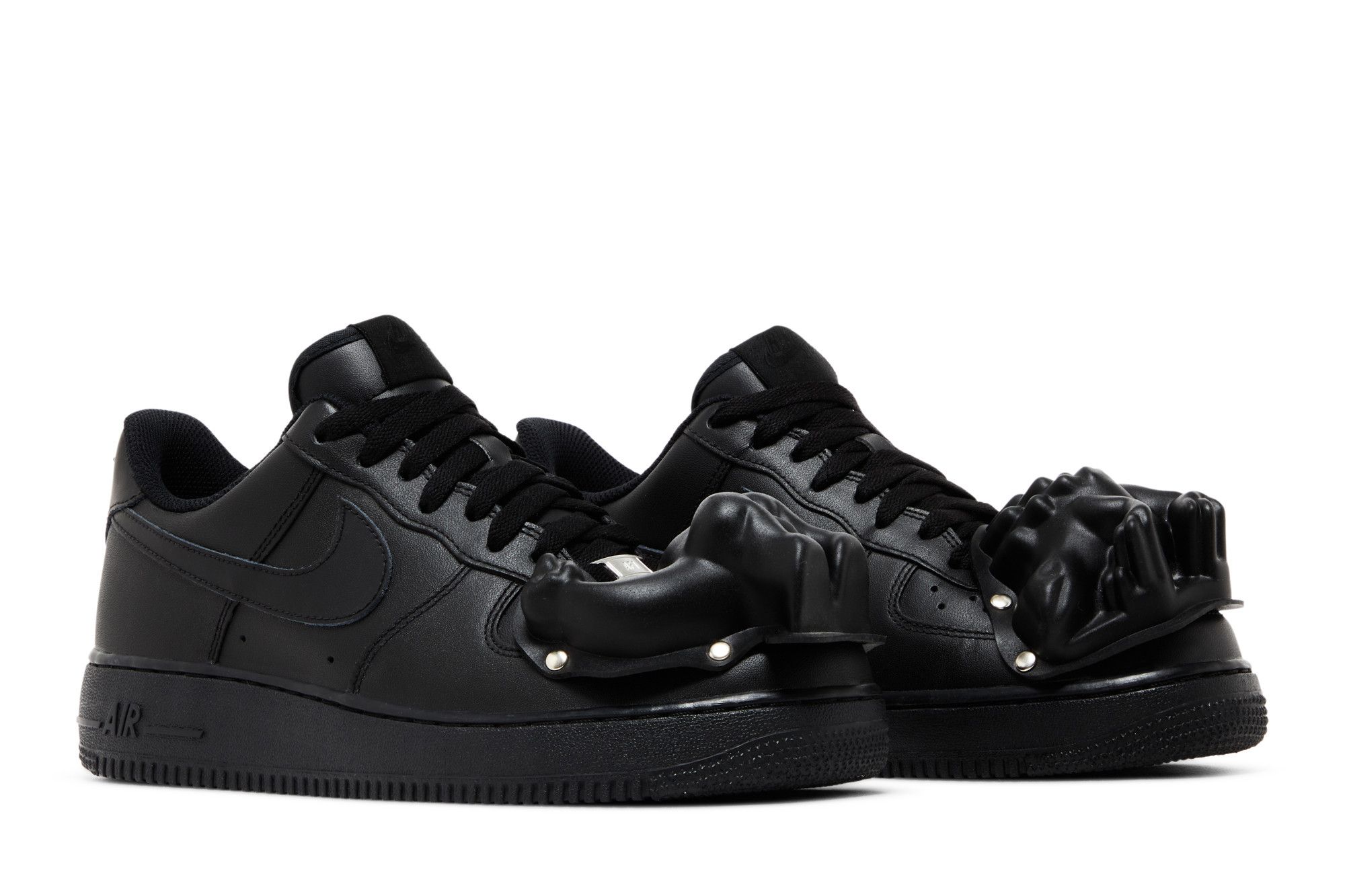 COMME des GARÇONS customized Nike Air Force 1 with dinosaurs