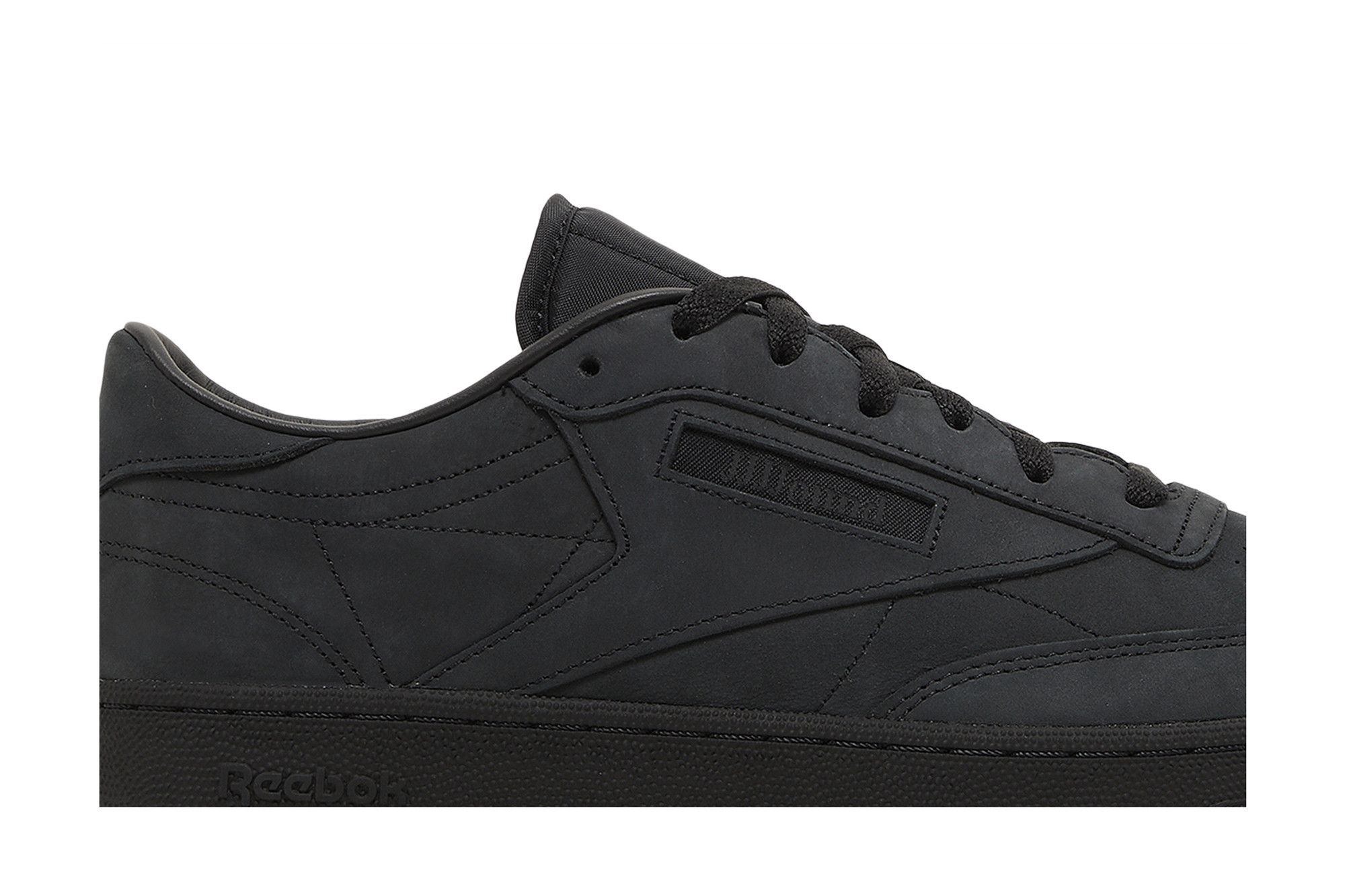 Triple black reebok on sale