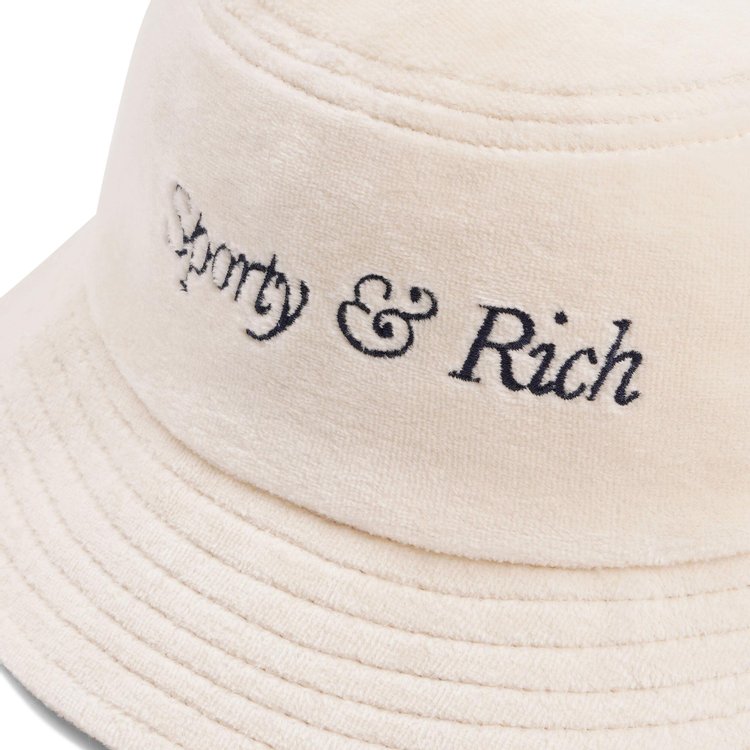 Sporty  Rich Italic Logo Embroidered Velour Bucket Hat CreamNavy