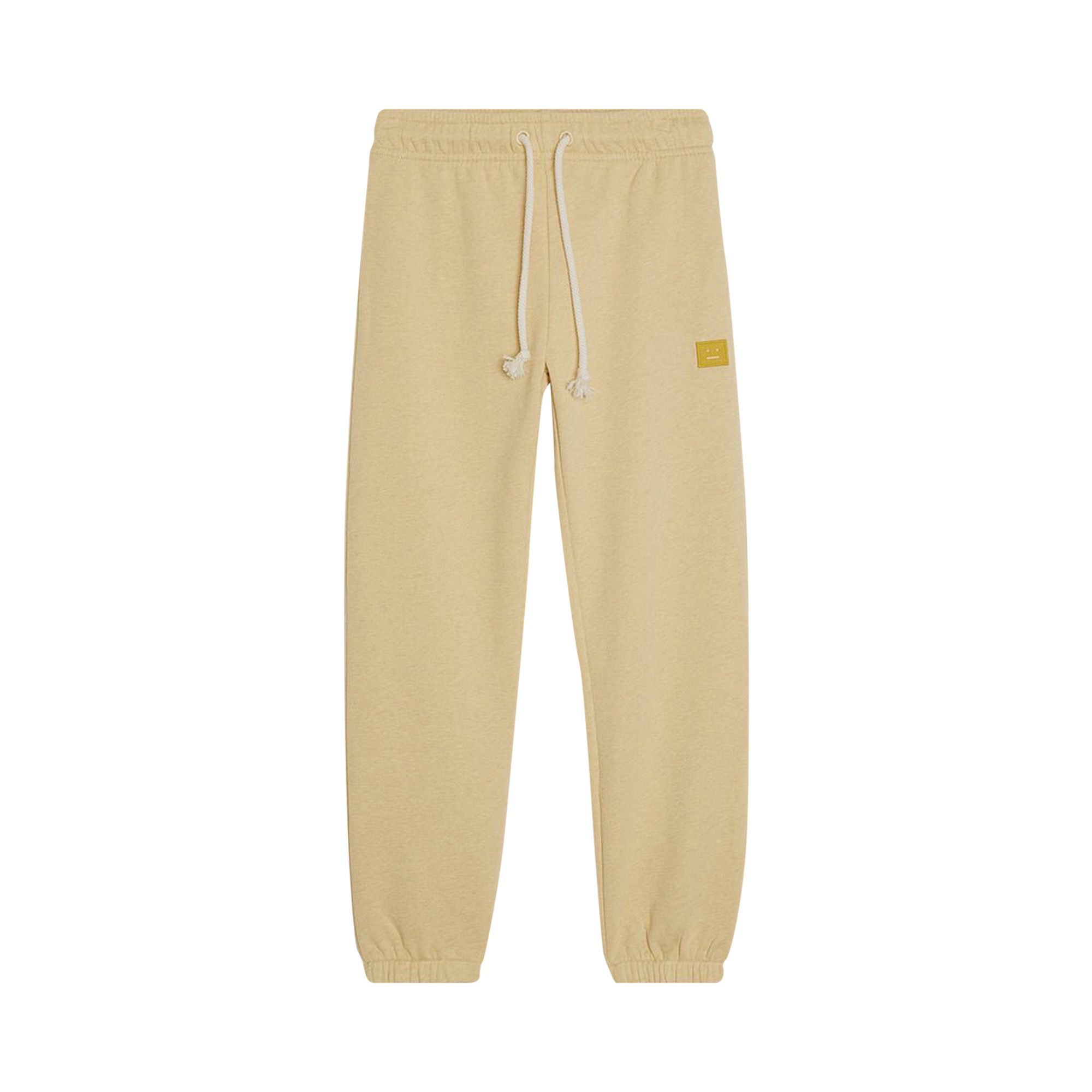Pale yellow sweatpants top