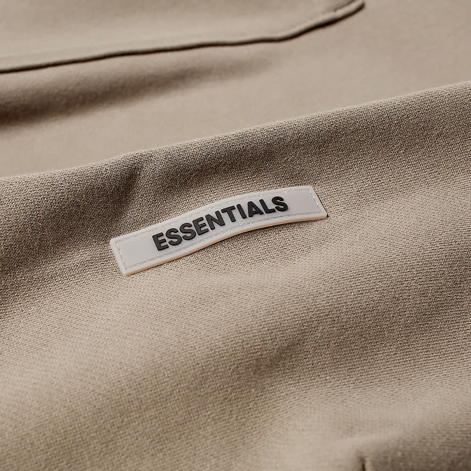 Fear of god essentials hoodie cement best sale