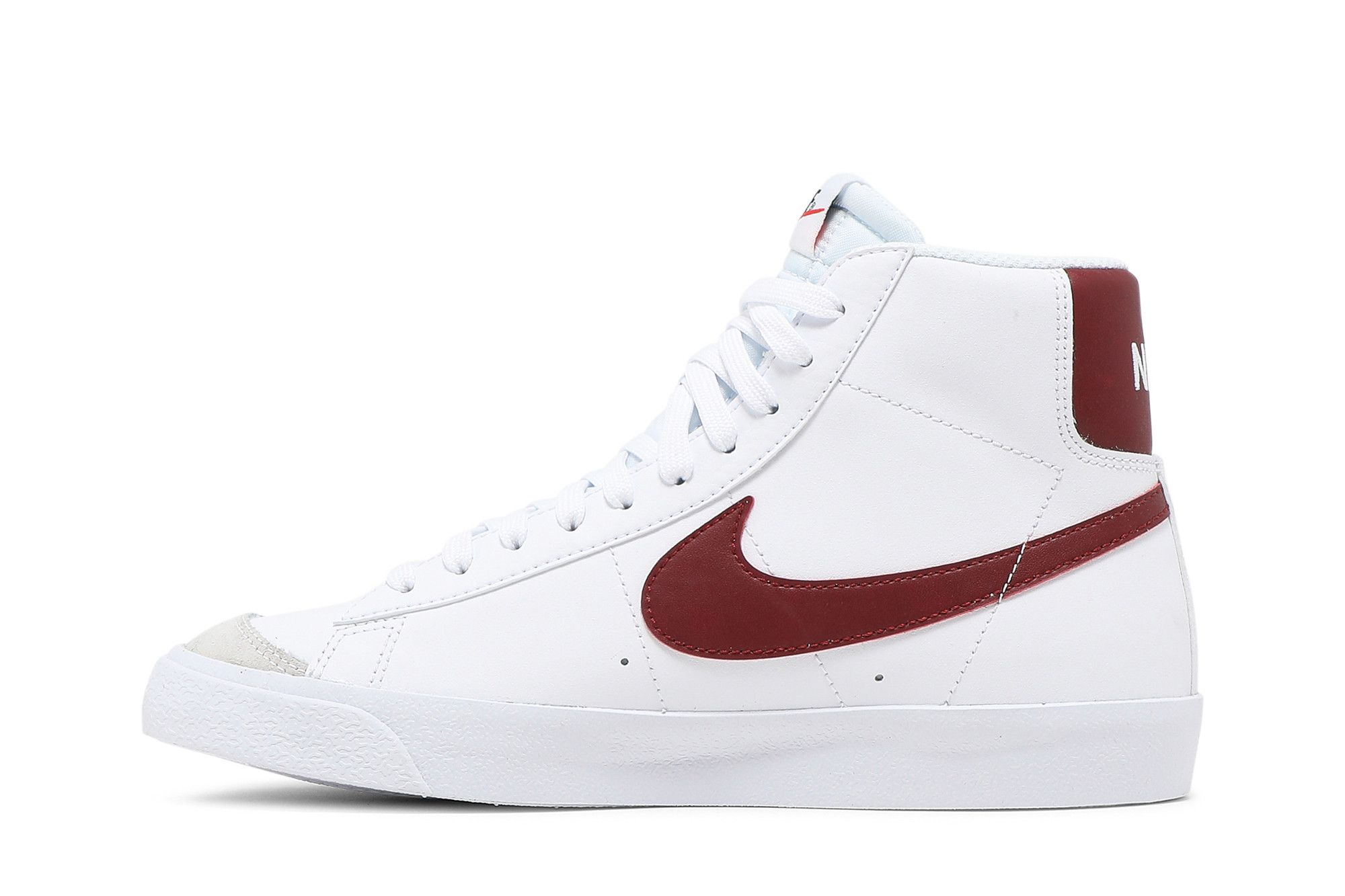 white and red nike blazers