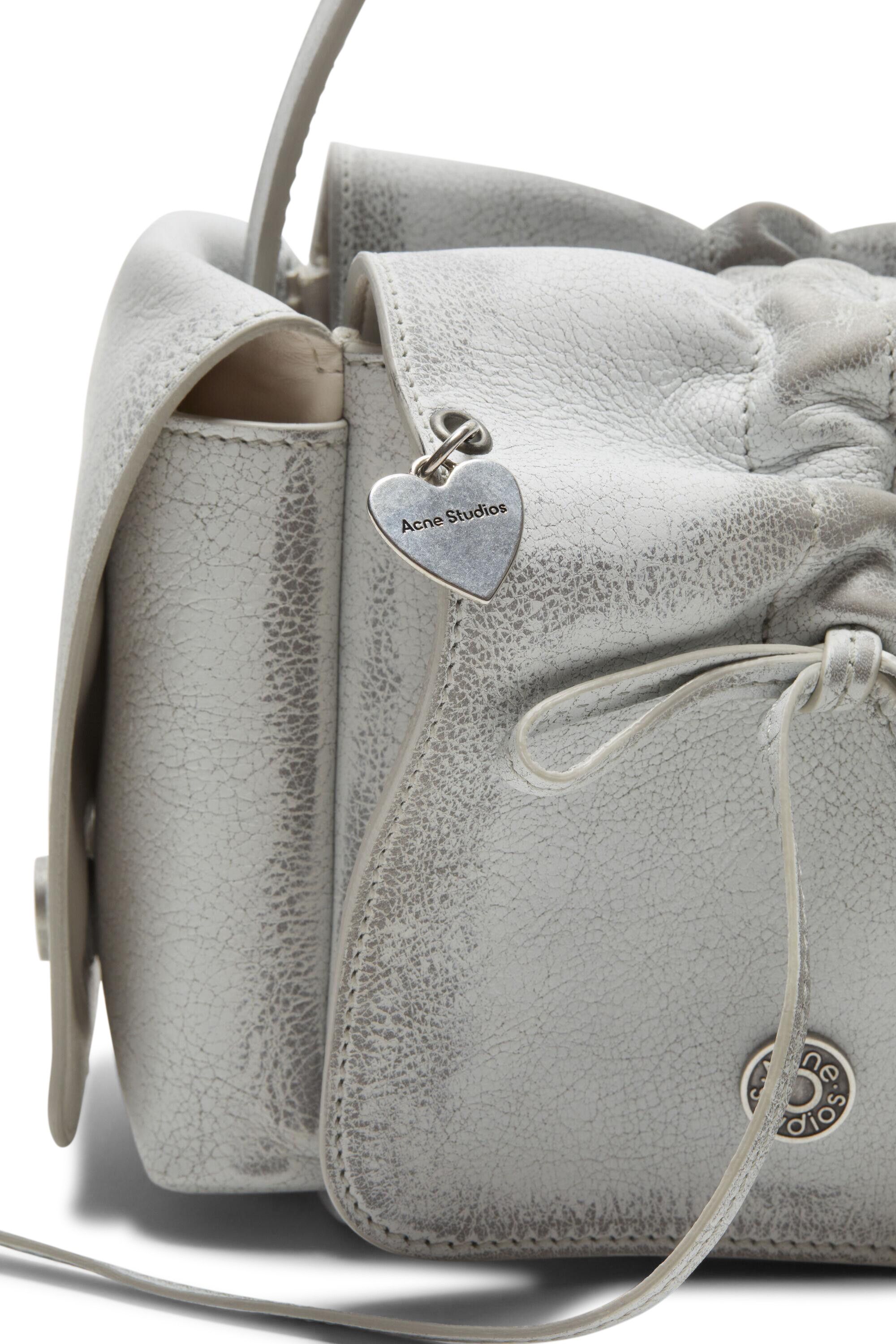 Buy Acne Studios Multipocket Bag 'White/Grey' - A10368 GOAT WHIT
