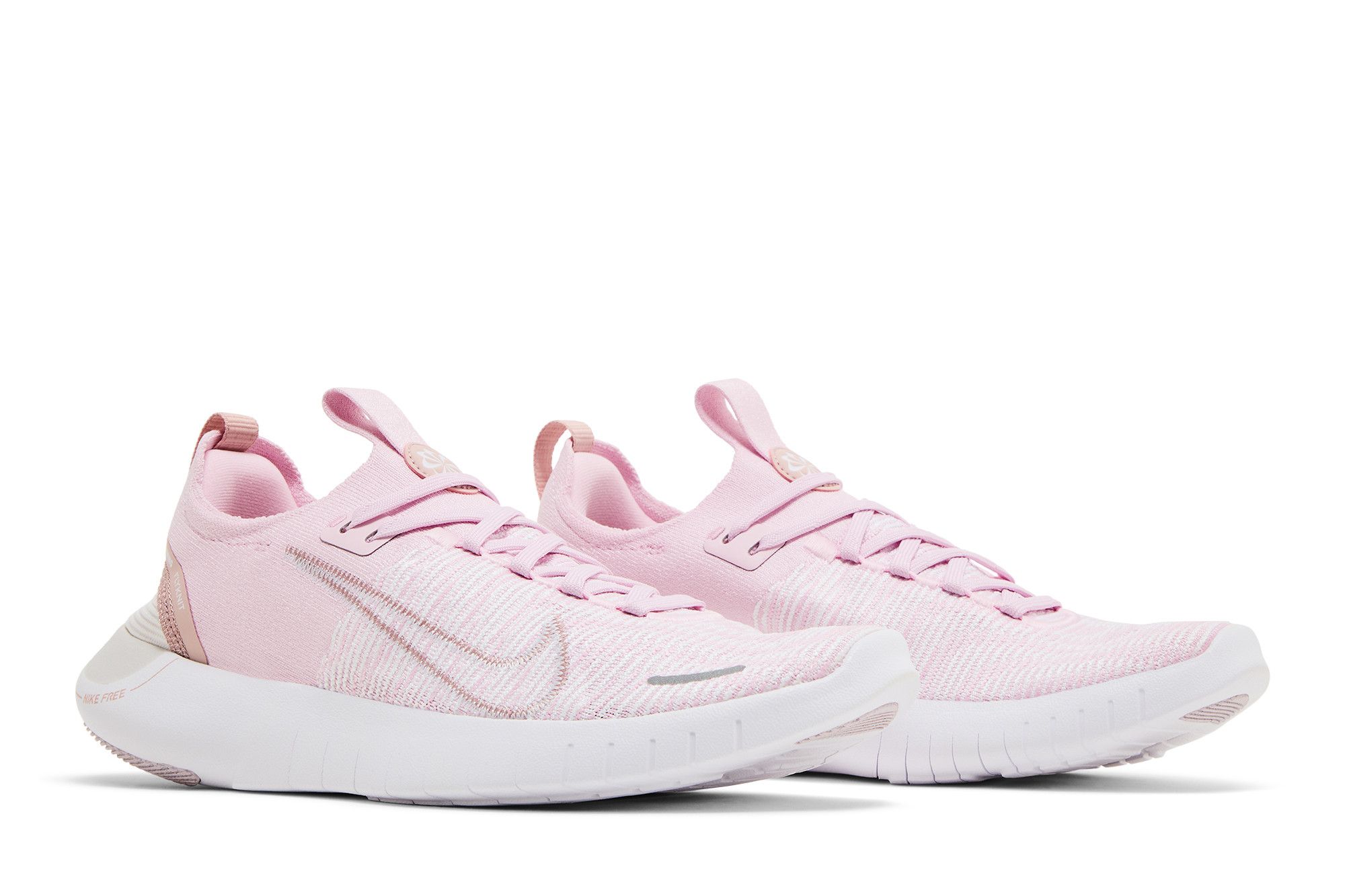 pink nike freeks