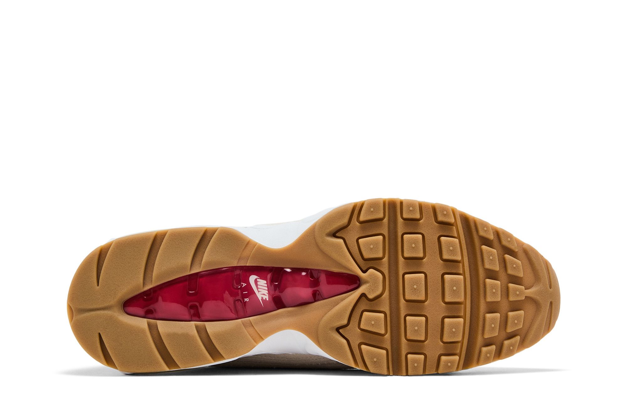 Imagem da sola do tênis Levi's x Air Max 95 OG Light Orewood Brown, com padrão de tração em borracha marrom e canal visível em vermelho com logo Nike, contra fundo branco.
