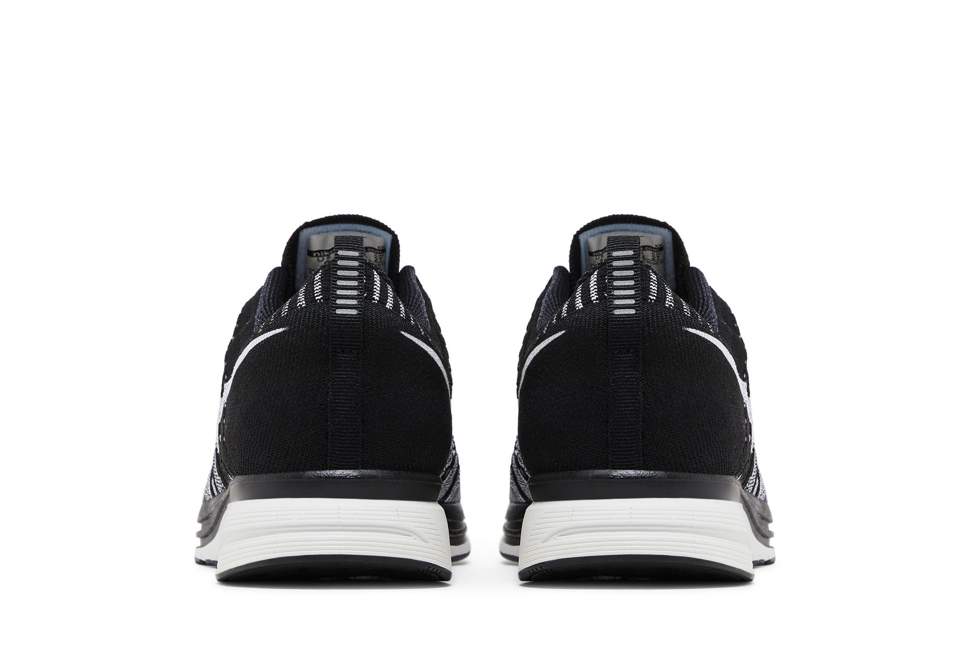 flyknit trainer black and white