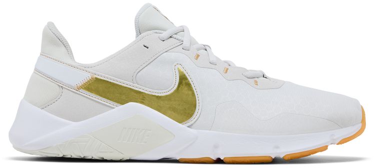 Nike Wmns Legend Essential 2 Platinum Tint Metallic Gold Star