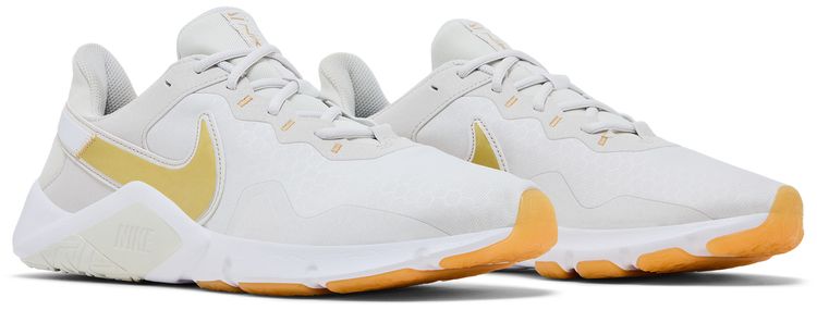 Nike Wmns Legend Essential 2 Platinum Tint Metallic Gold Star