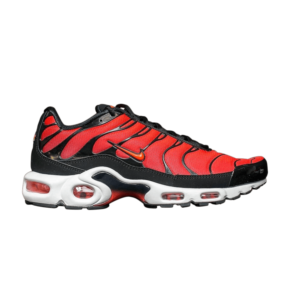 orange and red air max plus