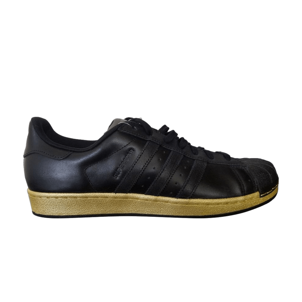 Black with hotsell gold shell toe