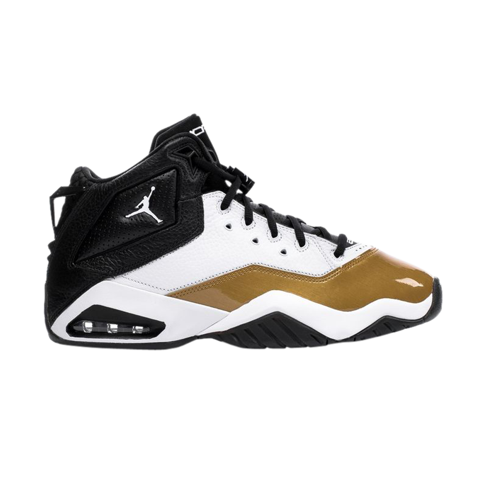 gold and white and black jordans