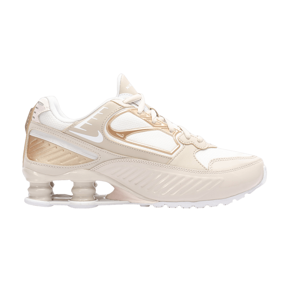 Nike shox enigma 9000 women's gold best sale