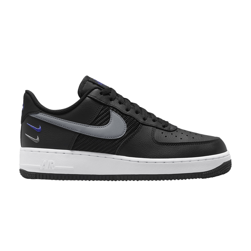 black nike with blue swoosh