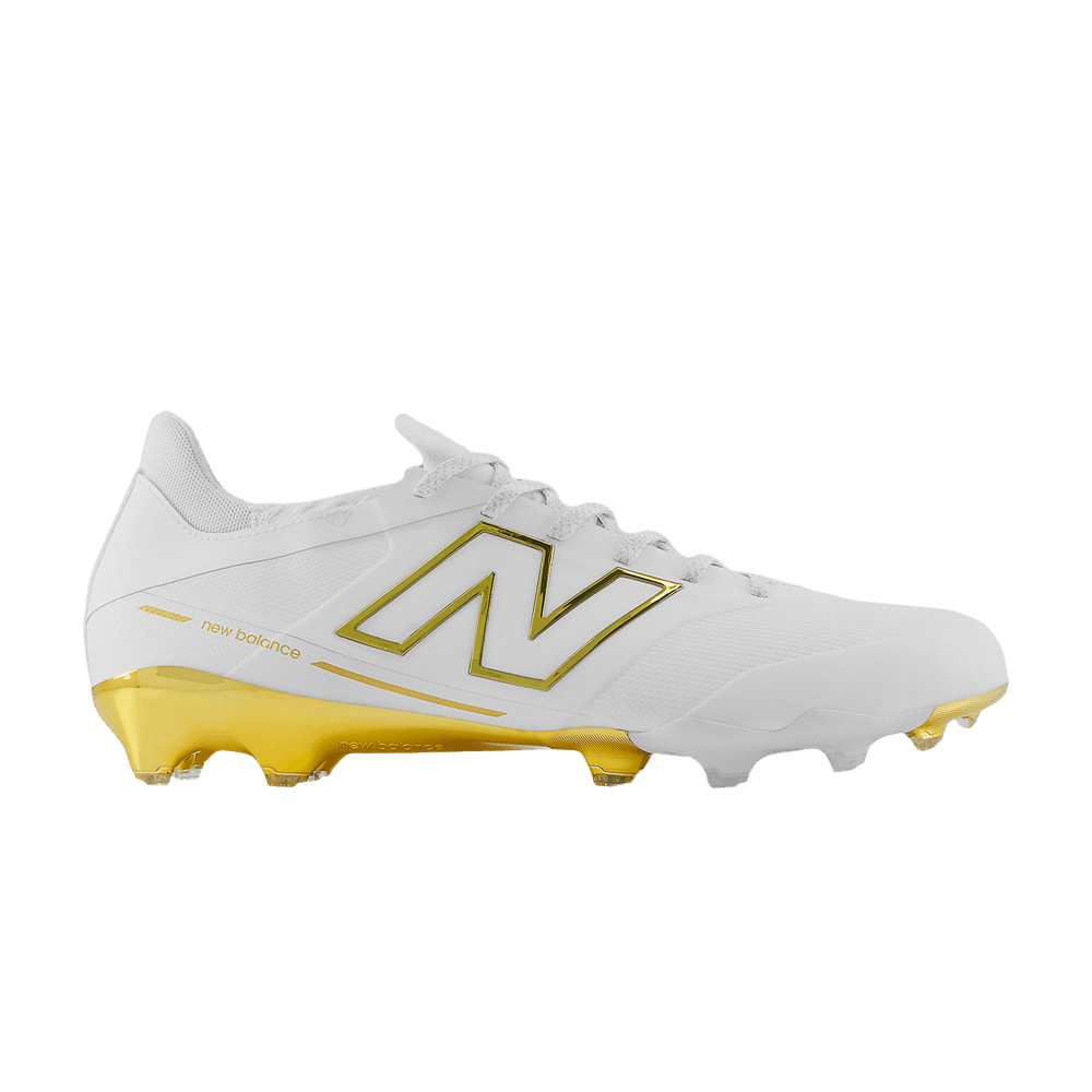 white and gold new balance baseball cleats
