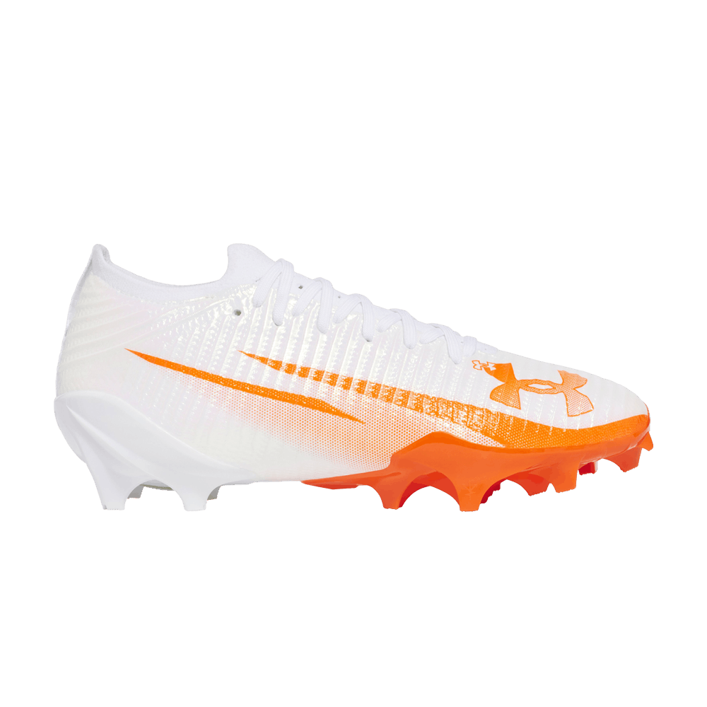 orange and black under armour football cleats
